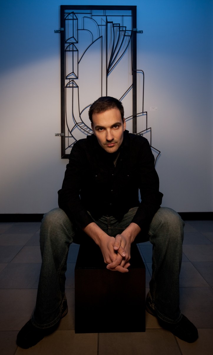 Artist Steven Lockwood with one of his creations.